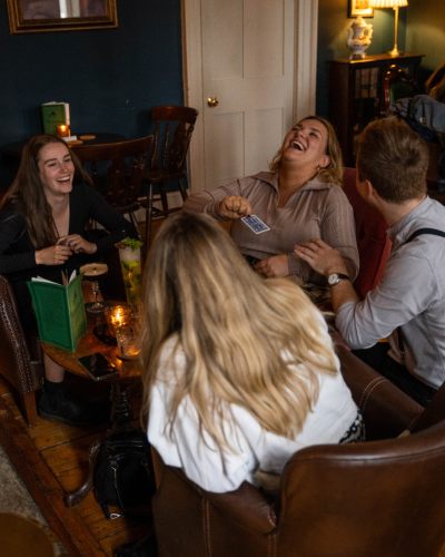 Guests laughing during a performance